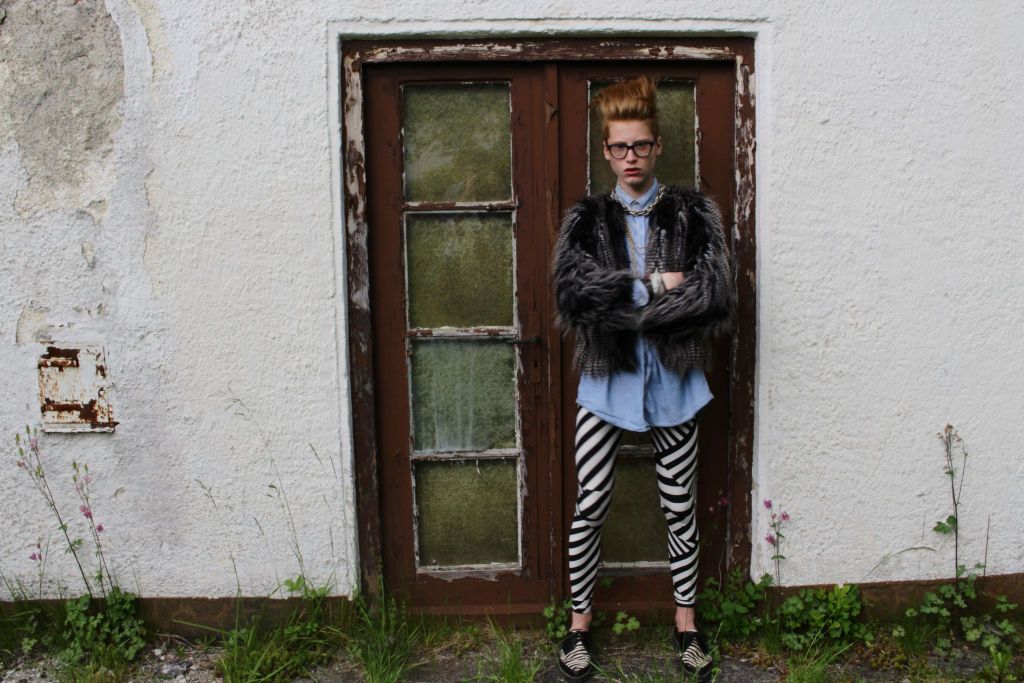 His trademark are the different glasses.